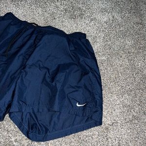 Navy blue Nike running shorts